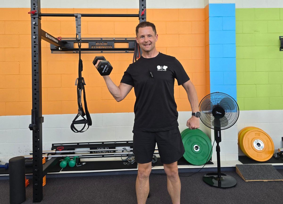 Gavyn Berntsen with a suspension trainer at the Growing Younger studio
